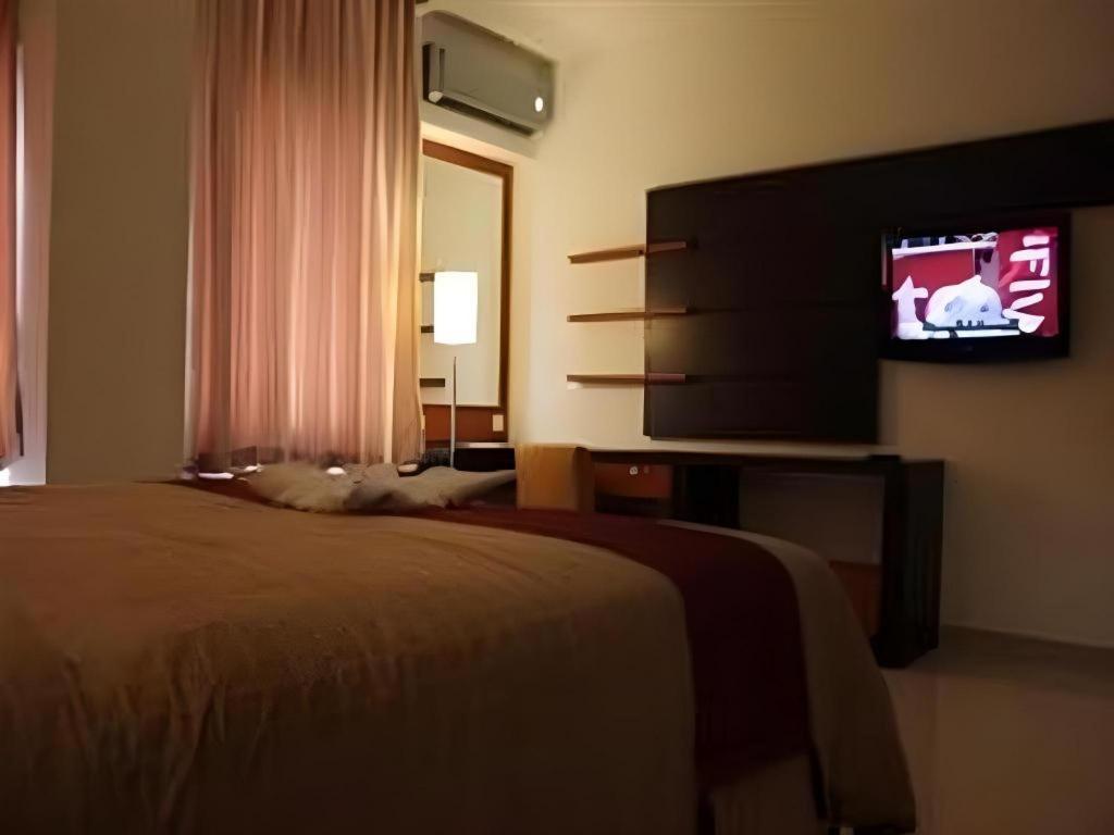 Travello Hotel Манадо Екстериор снимка