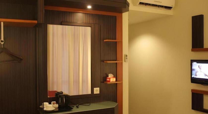 Travello Hotel Манадо Екстериор снимка