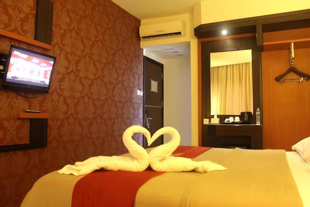 Travello Hotel Манадо Екстериор снимка