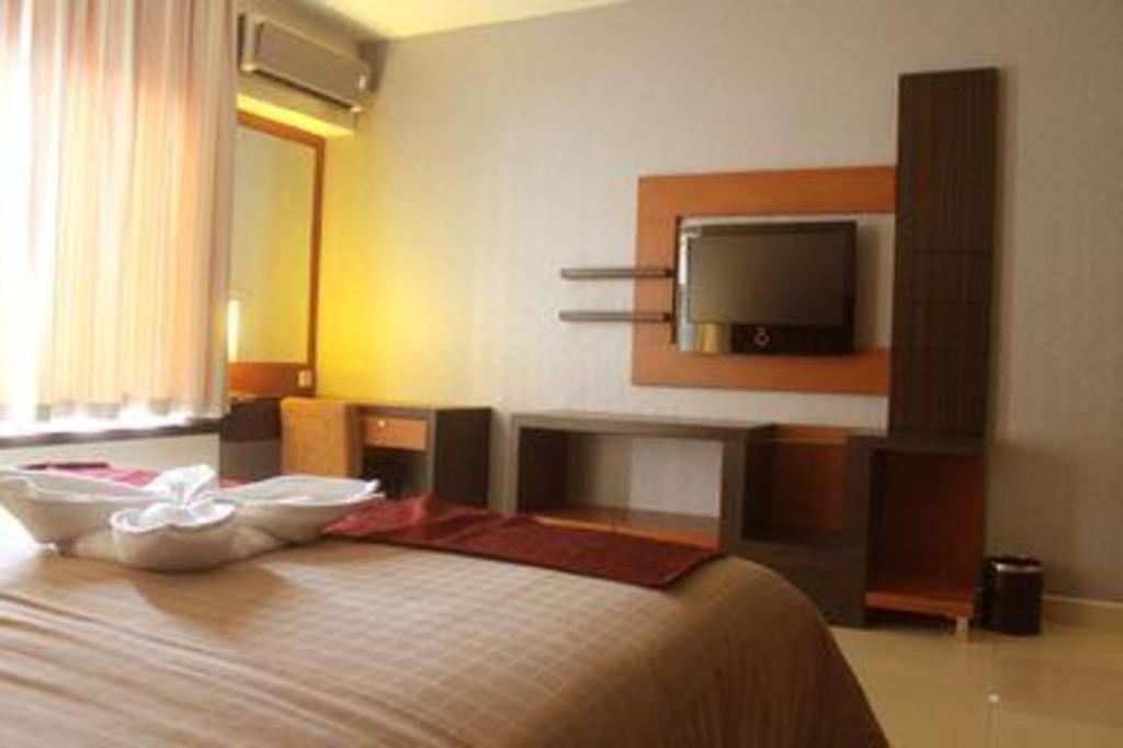 Travello Hotel Манадо Екстериор снимка