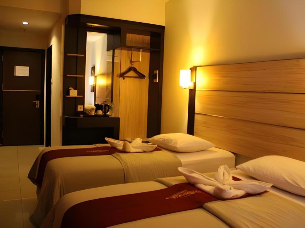Travello Hotel Манадо Екстериор снимка